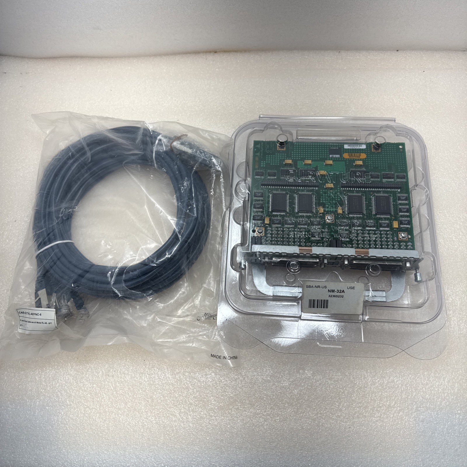 CISCO ASYNC-32A 32-Port Asynchronous Serial Network Module NM-32A w/ OCTAL CABLE