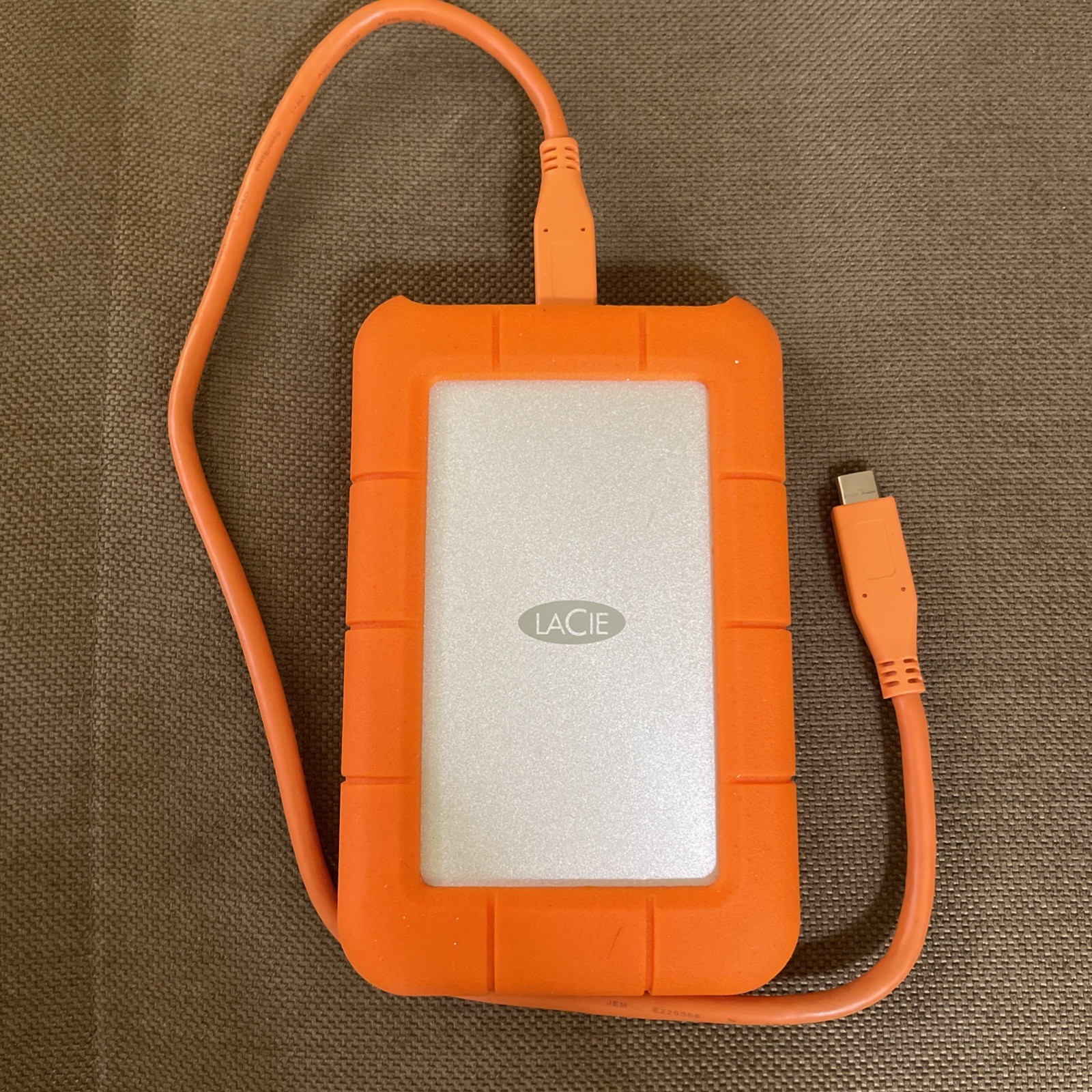 LaCie Rugged 1TB USB-C 2.5in External HDD Rugged Orange/Silver Neil Poulton