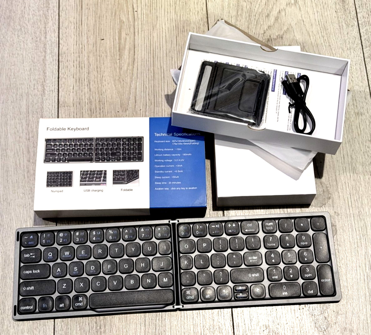 RoHS Foldable Bluetooth Keyboard FK328 Numpad USB Charge Ultra Slim New