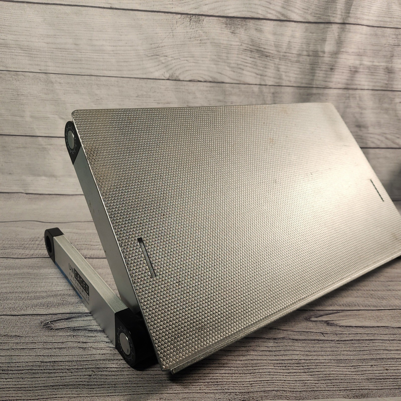 Uncaged Ergonomics WorkEZ Adjustable Laptop Stand Silver Aluminum Lap Desk Riser