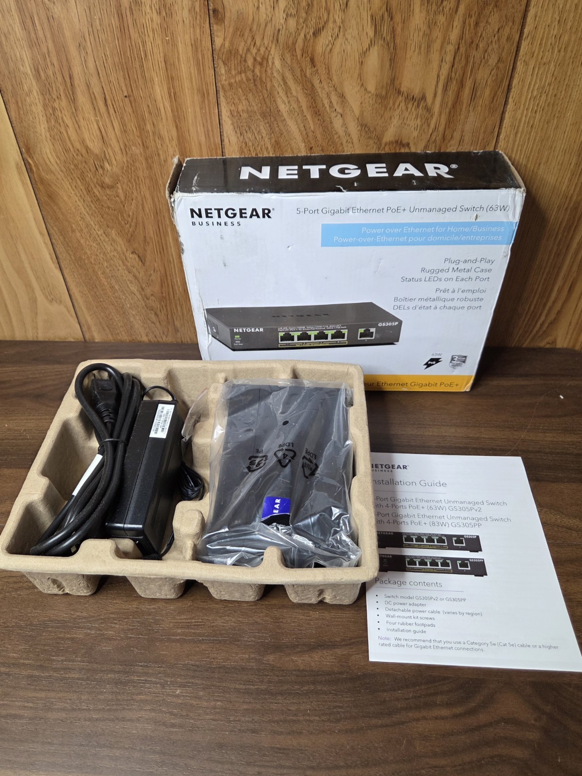 NETGEAR GS305P 5 Port Unmanaged PoE Switch  Black  New Open Box