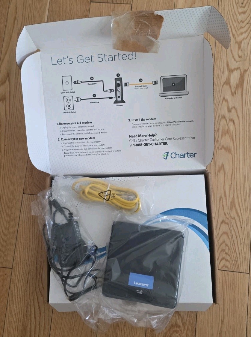 Linksys Cisco CM100 100 Mbps Cable Modem with USB, Coax and Ethernet