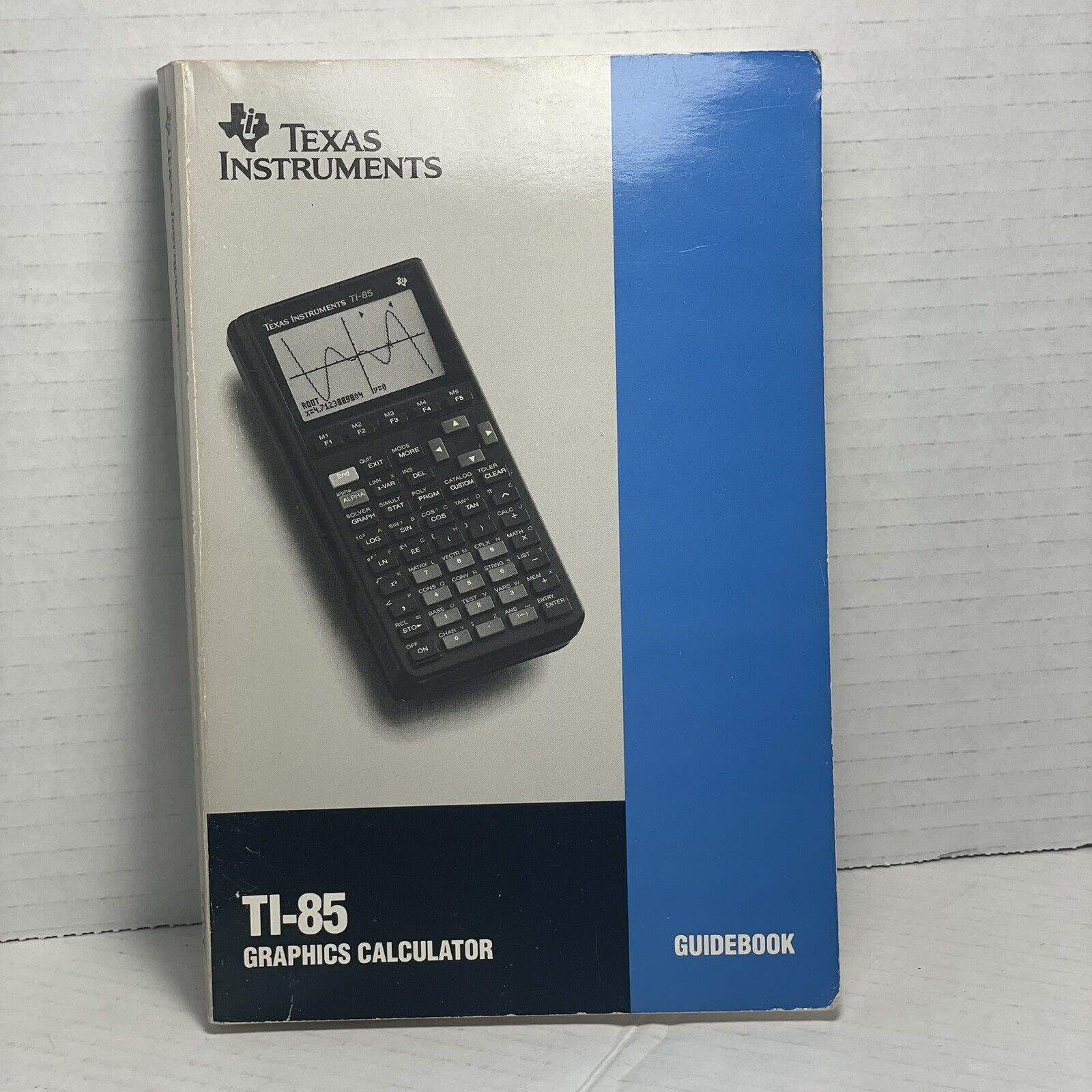 TEXAS INSTRUMENTS TI-85 Graphic Calculator, Guidebook 1069814–0201 ￼G.B. Co.1993