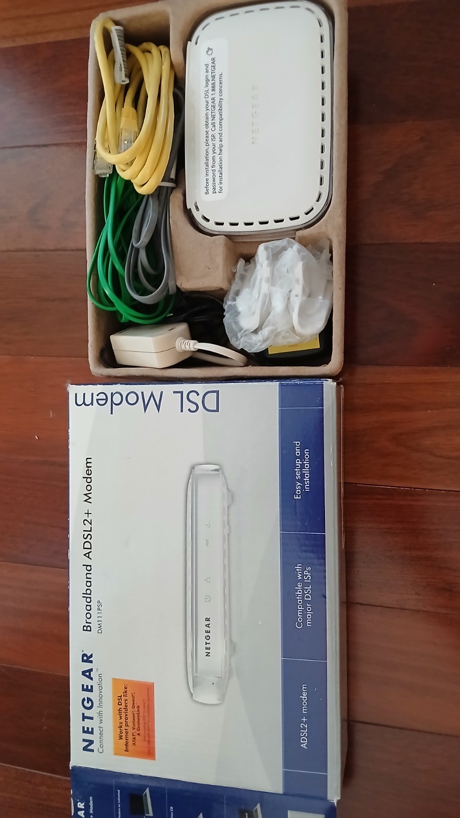 Netgear DM111PSP Broadband ADSL2+ DSL Modem – Complete with Accessories