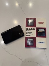 Casio Boss 64 KB Vintage SF-7500  DIGITAL DIARY w/Manual Powers On Display Issue picture