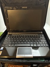 ASUS Eee PC Seashell netbook with ASUS plug and power brick 10.1 inch screen picture