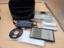 Canon SELPHY CP910 Wireless Dye-Sub Color Photo Printer Bundle Very nice picture