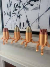 3D Printed bullet dude - shelf decoration Models, PLA Silk. picture