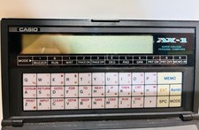Vintage Casio Super College AX-1 Pocket Computer Tested Working w/ Box & Manuals picture
