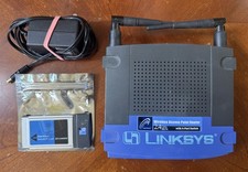 Linksys BEFW11S4 Wireless-B Router + WPC11 PC Card Bundle 802.11b Vintage WiFi picture