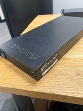 Two Linksys 24 port Metallic Gigabit Ethernet Switches picture