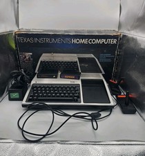 Vintage TI-99/4A Home Computer System with accessories, TV Adapter And Two Games picture