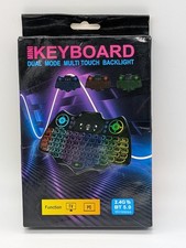 NEW V18 Mini Wireless Keyboard Backlit Multilingual 2.4G+BT4.2 AirMouse Touchpad picture