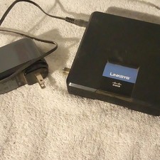 Linksys CM100 DOCSIS 2.0 Cable Modem 100 Mbps USB/Ethernet Black AD12V/1A-SW picture