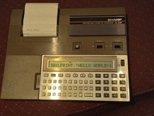 Sharp PC-1250A Pocket Computer, CE-123P Printer Cassette Interface Original Box  picture