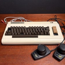 Commodore VIC 20  With Pair Of Paddle Controllers As Is For Parts Or Repair picture