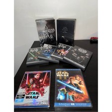 Star Wars Trilogy DVD Box Set, Episode II DVD, and The Last Jedi Blu-ray picture
