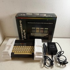 Vintage Commodore Plus/4 Black Software Built In Compact Home Computer picture