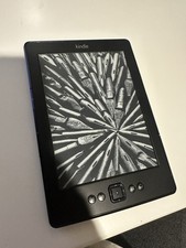 Amazon Kindle 4th Gen. D01100 eReader 2GB, Wi-Fi, 6-inch Black Button USB Port picture