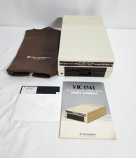 Commodore VIC-1541 Floppy Disk Drive C64 VIC-20 + Manual Demo Disk & Dust Cover picture