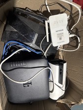 Box of 4 Routers, Worked When Last Used Before Stored But Currently Untested picture