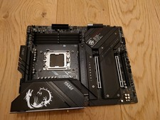 DAMAGED FOR PARTS ** MSI MPG X670E CARBON WIFI DDR5 AM5 AMD ATX MOTHERBOARD picture