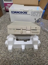 Commodore 1571 Disk Drive In Original Box Cables Untested Powers On picture