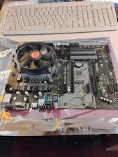 Asrock Z390 Pro 4 board and I5-8600k cpu with fan. an extra system clean low use picture