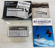 Junk Sharp PC-1245 Pocket Computer Electronic Calculator with Box & Manual Japan picture