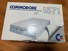 ** Commodore 1571 Disk Drive w/ Manual, Cables, Box, Head Vibration Protector picture