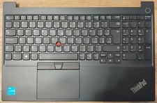Laptop keyboard complete with palmrest, touchpad and power button. picture