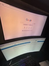 Dual Monitor Aoc and Samsung Both 28in Width by 17 In Height Black picture