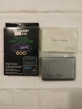 SHARP EL-6330 TRAVEL ORGANIZER 600 NEW COMPLETE STOCK NEVER USED picture