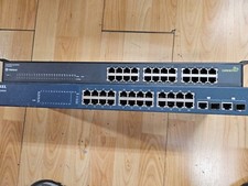 Lot of ZyXEL ES-1124 Ethernet Switch 24 Port & Trendnet te100-s24g Switch picture