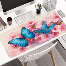 A Large Gaming Mouse Pad Featuring a Watercolor-Style Blue Butterfly Resting o picture