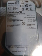 Seagate ES ST1000NM0001 1TB 7200RPM 3.5” SAS Hard Drive, P/N 9YZ264-881  Recert  picture