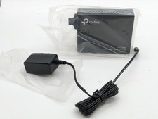 TP-LINK MC100CM(UN) Fast Ethernet Media Converter w/ AC ~  picture