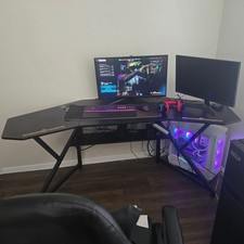 Gaming computer with 2 monitors, includes desk and chair. picture