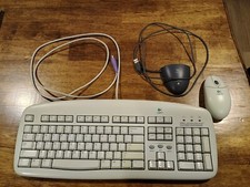 Logitech Deluxe Access 867091-0100 Wired Keyboard and Cordless Wheel Mouse USB picture