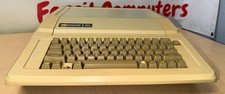 Apple IIe Computer A2S2064 w/AIIE 80 Coliumn and Disk II Interface Cards picture