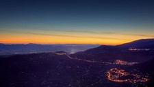 Landscape dusk orange sky city lights aerial view dark Custom Gaming Mat Desk picture
