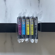 Sealed Genuine Epson Ink T200 Ink Cartridges (Black Cyan Magenta Yellow) picture