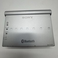 Sony BTA-NW1 Silver Bluetooth Function Modem Adapter w/ MDM-5614G PC Card Modem picture