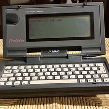 Vintage Atari Portfolio HPC-004 Palmtop Computer Tested Working + 32KB Card picture