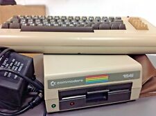Vintage COMMADORE 64 Keyboard w Cover, Power Supply, and Floppy Drive Model 1541 picture
