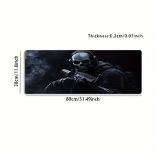 A Large Gaming Mouse Pad Featuring a Skull Mask Warrior with a Gun Battle Desi picture