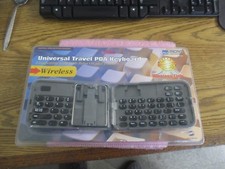 Micro Innovations Universal Travel PDA Keyboard. Model: TKB750U. Unused  picture