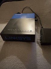 Linksys LRT214 Gigabit Wired VPN Router with some superficial damage picture