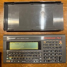 Sharp PC-E200 Pocket Computer with Box and Manual - Used picture