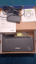 Epson WF-100 Portable Wireless Printer includes: Ink, Manual, Power Cord and CD picture